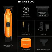 Coco Hyper Veloce Pro Trimmer with accessories on a black background