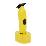 Yellow grooming clipper with black accents on a clear background