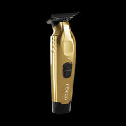 Cocco Veloce Pro Trimmer gold angled view showing ergonomic design and precision blade