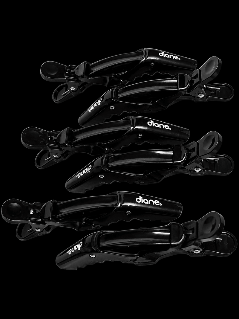 Set of black hair clips with 'diane' branding on a black background