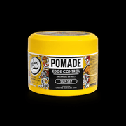 Yellow jar of pomade with a black label on a white background