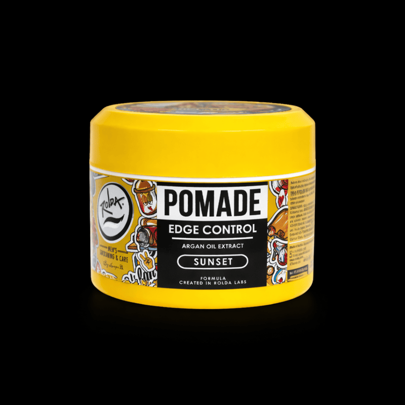 Yellow jar of pomade with a black label on a white background