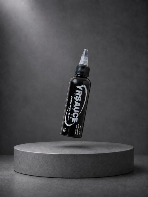 YR Sauce Enhancement Black 4oz bottle floating above a grey display pedestal