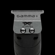 Stainless steel X-Pro Wide trimmer blade on black background