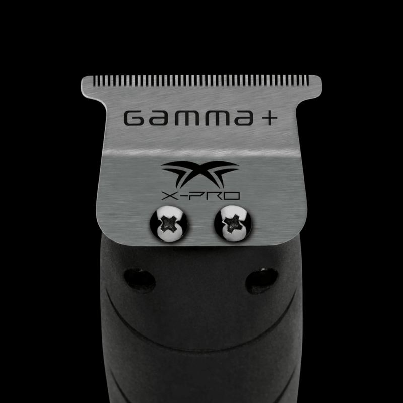 Stainless steel X-Pro Wide trimmer blade on black background