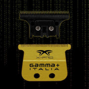 Yellow and black grooming tool with 'Gamma Italia' branding on a dark background