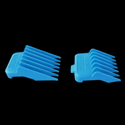 Two blue plastic combs on a black background
