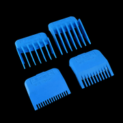 Four blue hair clipper comb attachments on a black background