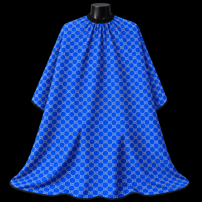 Blue Gucci Barber Cape - front-facing view showing the all-over white interlocking monogram print on a royal blue lightweight water-resistant polyester cape