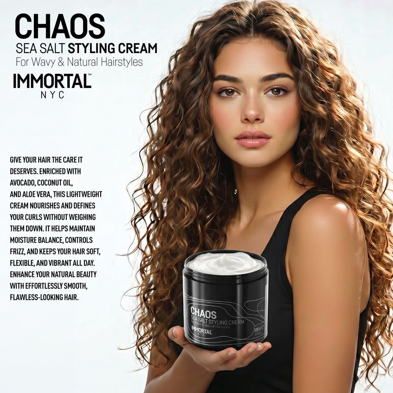 Woman with long curly hair holding Immortal NYC Chaos Sea Salt Curl Cream