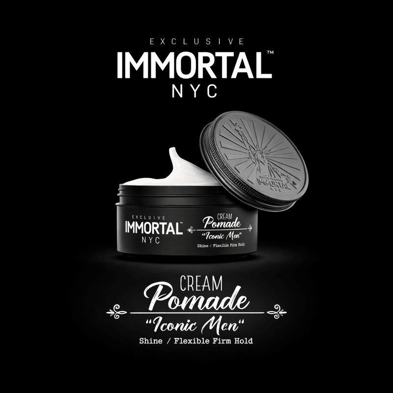 Immortal NYC Cream Pomade jar with open lid with expanded label wording on a black background