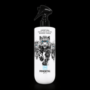 White bottle with black leopard design and 'Immortal NYC' branding on a black background
