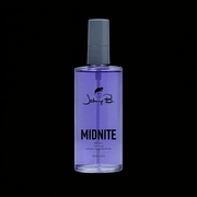 Purple bottle of Johnny B. Midnite on a black background