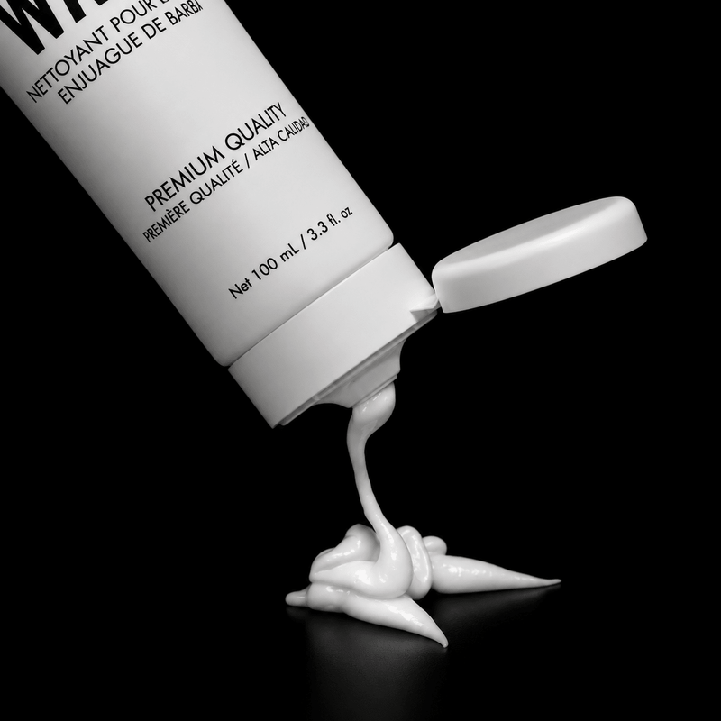 Johnny B Beard Wash – tube with cream texture on black background