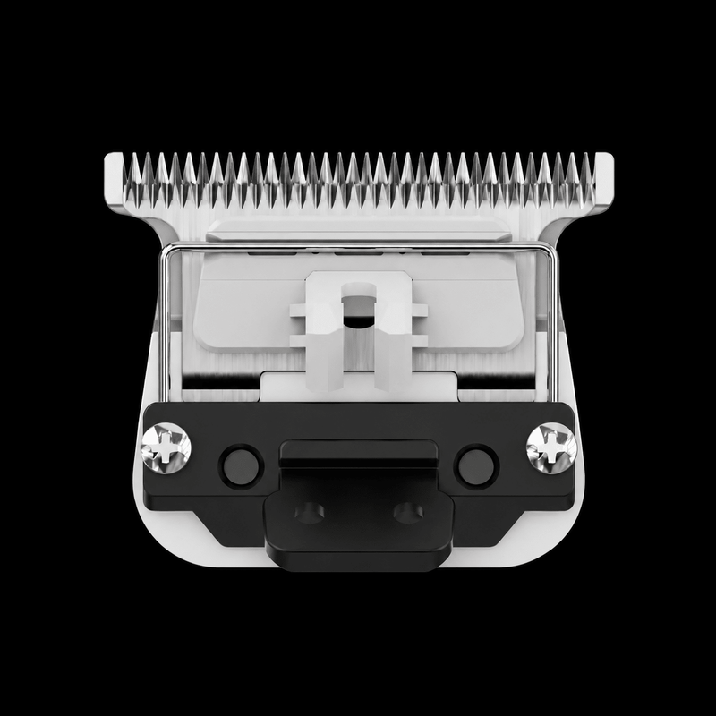 Hair clipper head with comb attachment on a black background