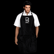 L3VEL3 Barber Apron Black Worn by a Professional Barber