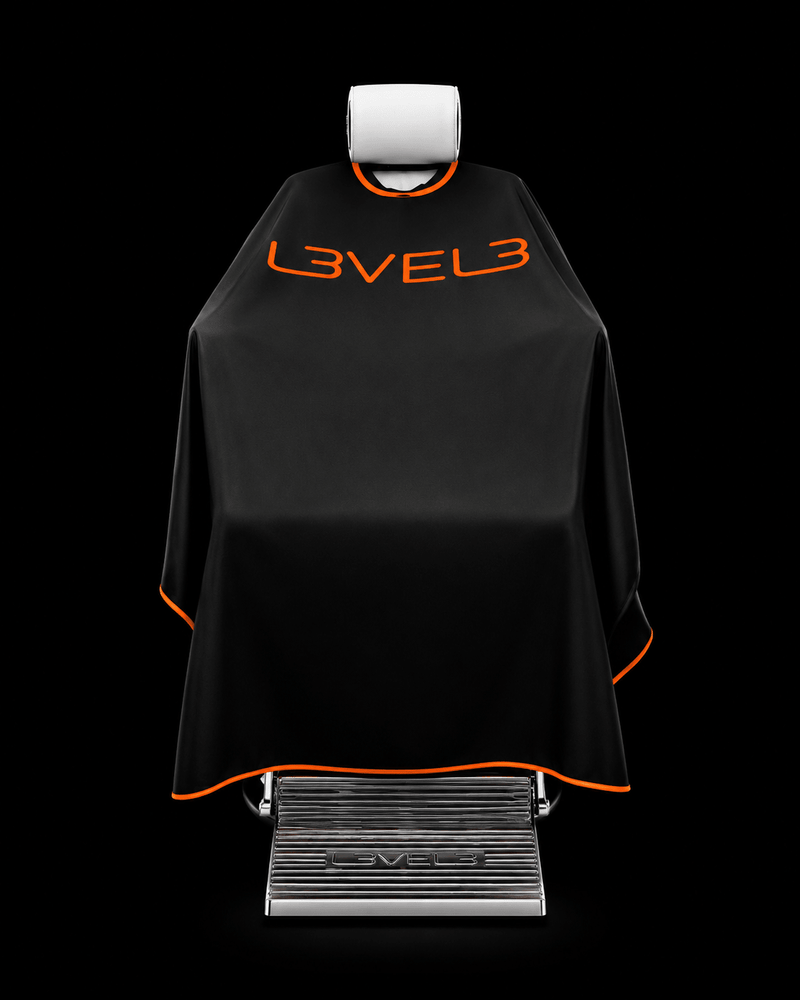 Black barber cape with 'LEVEL3' branding on a black background