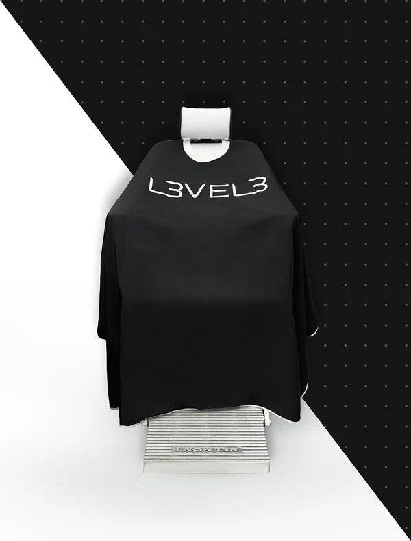 L3VEL3 Barber Cape Black with White Trim – on stand