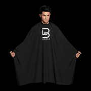 L3VEL3 Barber Cape with Rubber Neck Worn by a Professional Barber