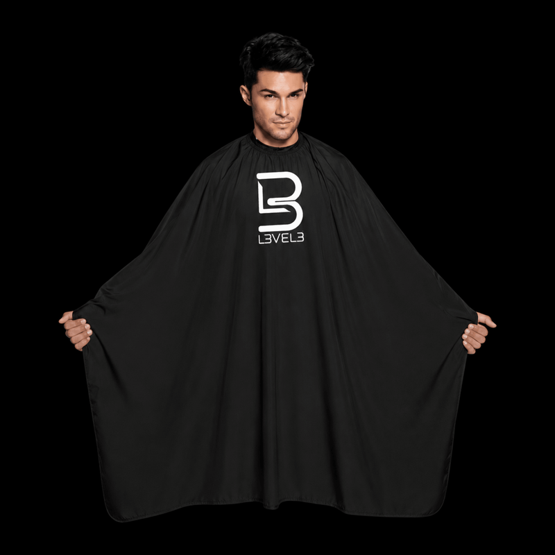L3VEL3 Barber Cape with Rubber Neck Worn by a Professional Barber