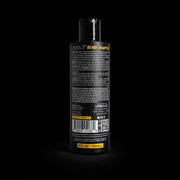 Back of beard shampoo bottle with black and yellow label on a black background