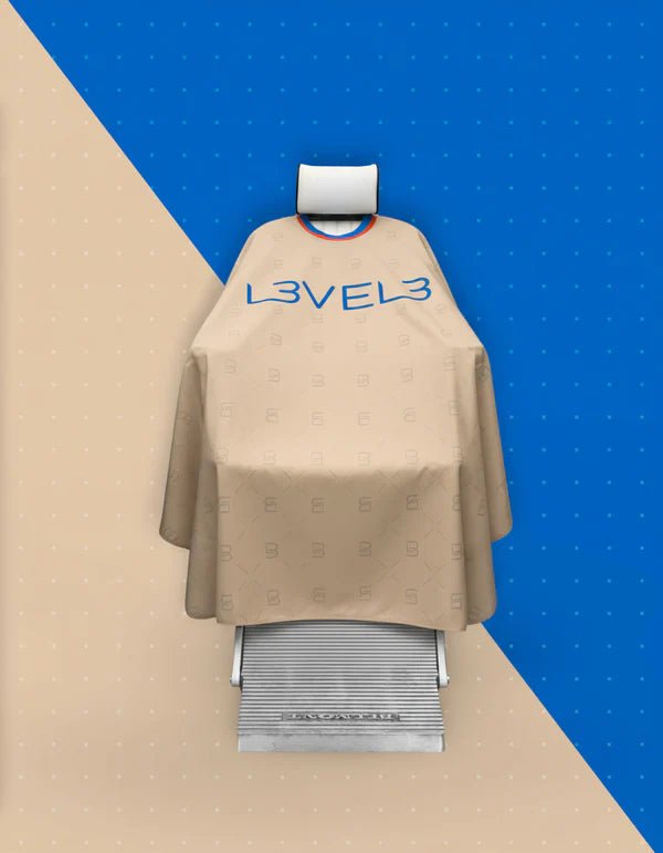 L3VEL3 Barber Cape Beige with Red Trim – lifestyle view