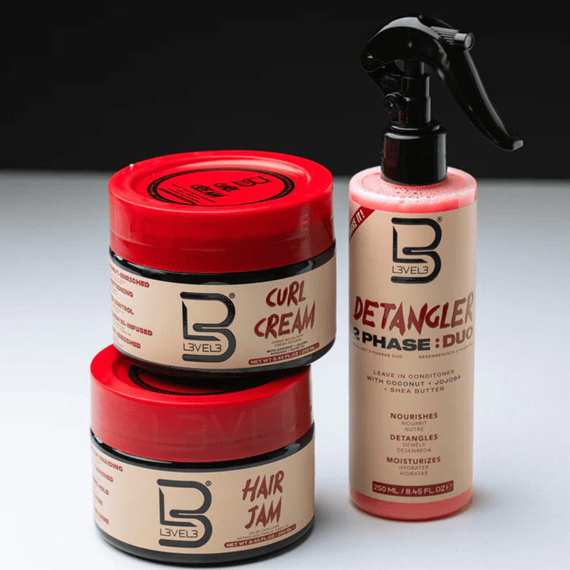 L3VEL3 Hair Braiding Jam jar for frizz control and shine next to curl cream and detangler spray