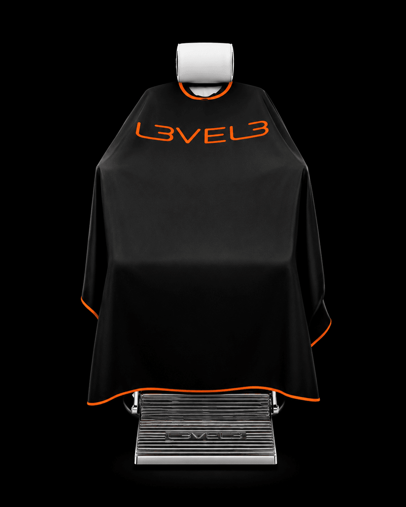 L3VEL3 Professional Rubber Neck Cutting Cape in black with red trim