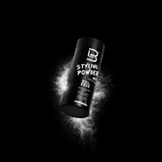 Black bottle of styling powder with dust showcasing with brand logo on a black background