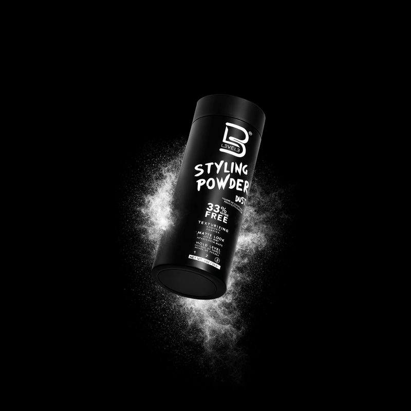 Black bottle of styling powder with dust showcasing with brand logo on a black background