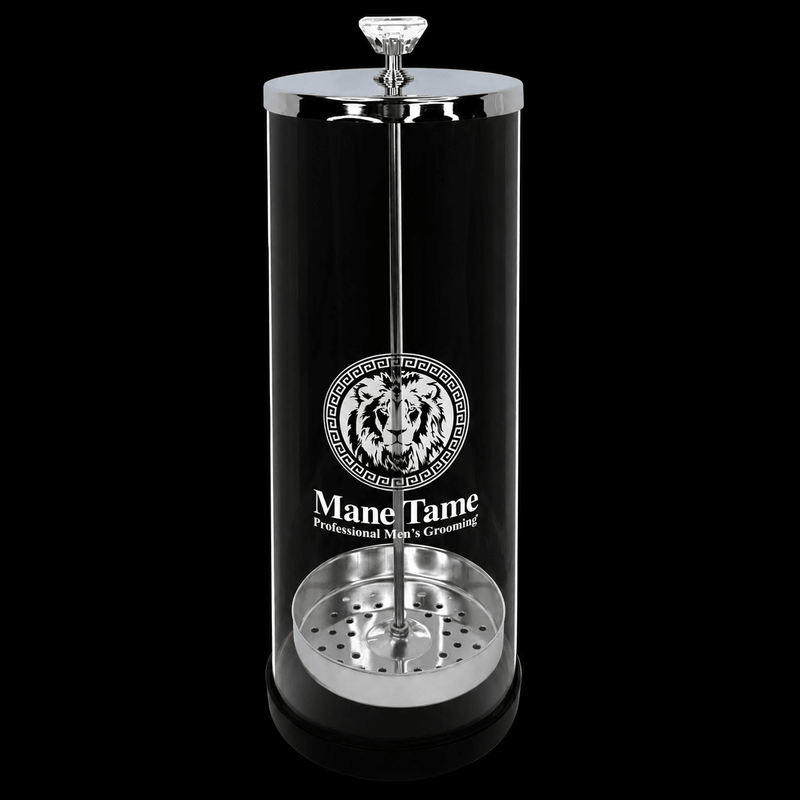 Black and silver hair product with 'Mane Tame' branding on a black background