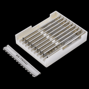Set of disposable razors in a white holder with a visible brand name on a black background