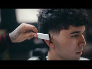 Barber using Wahl Vapor CE Limited Edition 26 cordless clipper for precision fading introduction