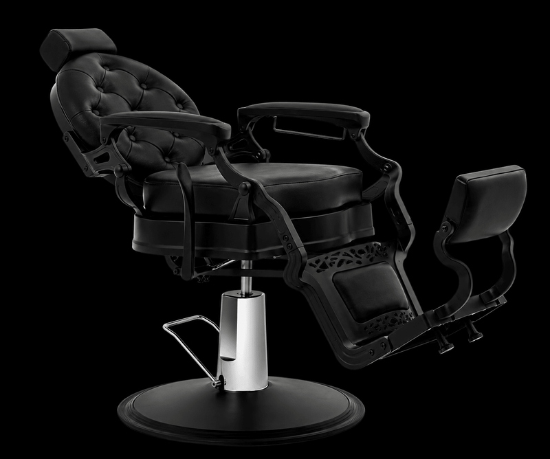 Primos Studio Barber Chair - side profile with backrest fully reclined demonstrating hydraulic reclining function all-black finish