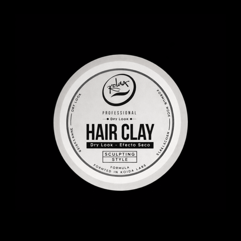 Koida Labs hair clay container on a black background