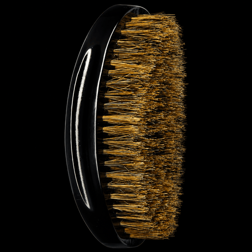 Side view of RED by KISS BR14 curved medium soft boar bristle palm wave brush