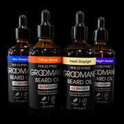 Red Pro Groomane Beard Oil collection featuring Sea Breeze Citrus Grove Fresh Daylight and Midnight Horizon scents for beard growth and hydration