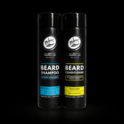 Two bottles of Zolbar Men's Grooming Care Beard Shampoo and Conditioner on a black background