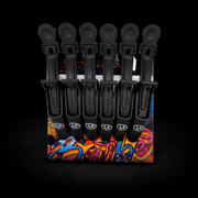 Set of black hair clips on a colorful display stand against a black background