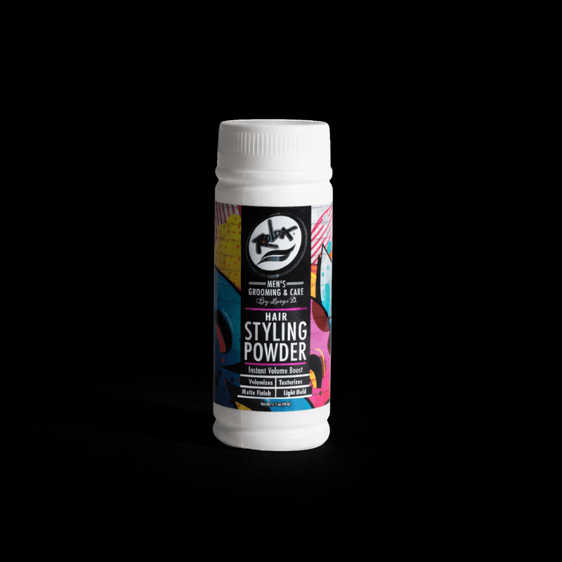 Hair styling powder bottle with colorful label on a black background. Primos Barber Supply
