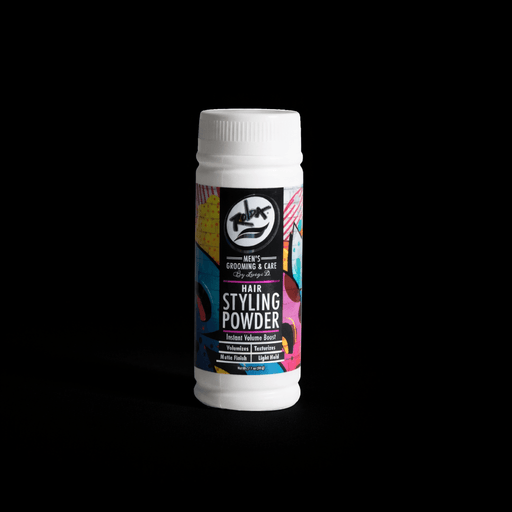 Hair styling powder bottle with colorful label on a black background. Primos Barber Supply