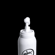 White bottle with a unique cap design on a black background