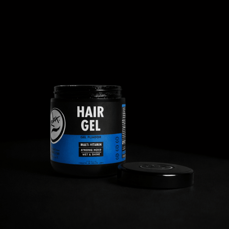 Hair gel open container with blue label on a black background