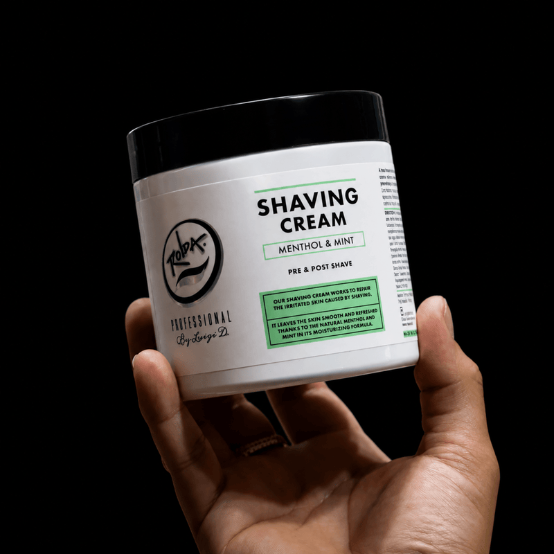 Rolda Professional Shaving Cream held in hand lifestyle image