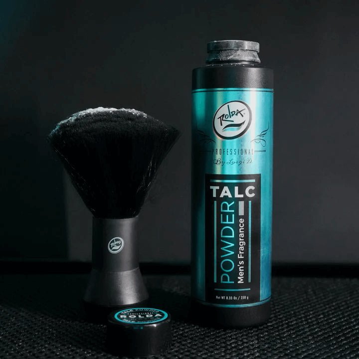 Talc powder bottle and brush with 'Zeta' branding on a dark background