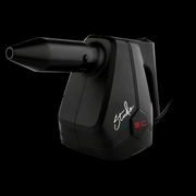 Black handheld steamer with 'Studio C' branding on a black background