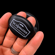 Scalpmaster Boar Bristle Barber Brush – back view held in hand showing brand logo