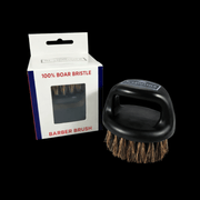 Scalpmaster black boar bristle barber brush with packaging on a black background