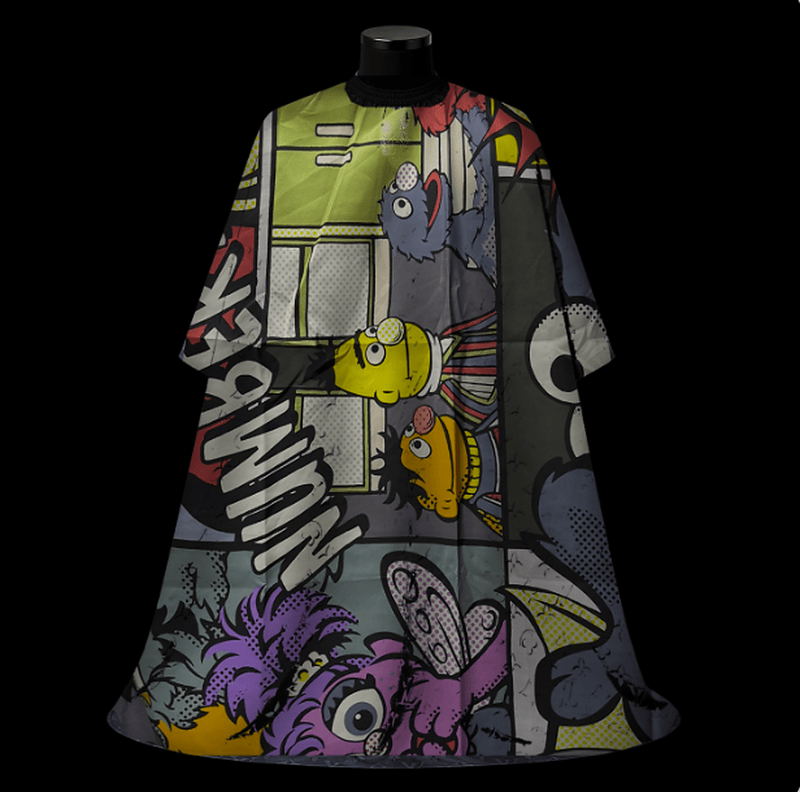 Sesame Street Kids Barber Cape - front-facing view showing the zombie puppet character comic print in multicolor on a lightweight water-resistant polyester cape