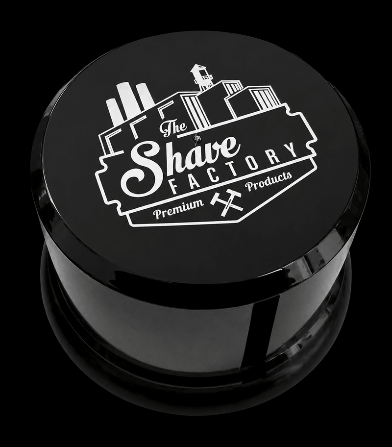 Black container with 'The Shave Factory' logo on a black background